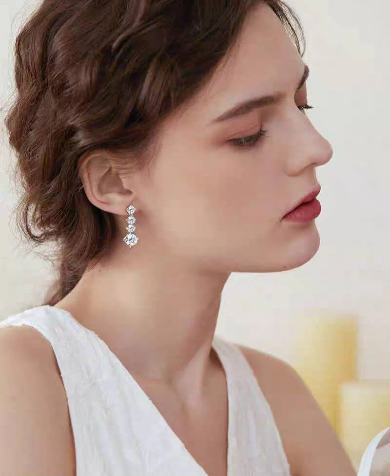 Understated Luxury Four Prong Drop Earrings - Image 3